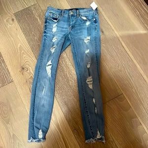 AEROPOSTALE ripped low rise jeans light wash size 3/4-27.